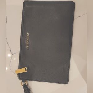 Authentic Burberry wristlet.
